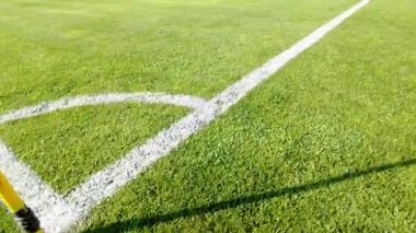 Corner pitch. Soccer, Football field grass. Close up of the lines and grass on a soccer pitch.