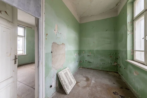 Interior of an abandoned hospital room. Creepy old room in psychiatric hospital