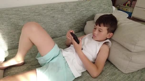 Little Boy Broken Leg Plaster Lying Bed Home — Stock video