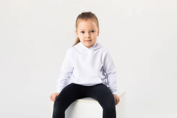 Girl White Blank Hoodie Sits White Background Kids Hoodies Mockup — Stock Photo, Image