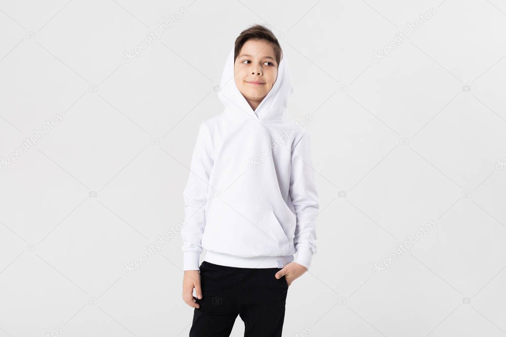 Stylish boy in white hoodie. Mock-up.
