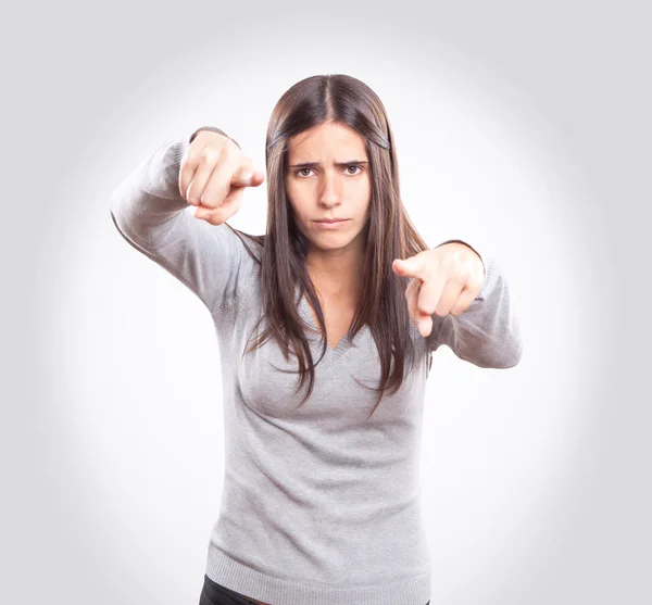 Young angry woman pointing — Stock Photo, Image