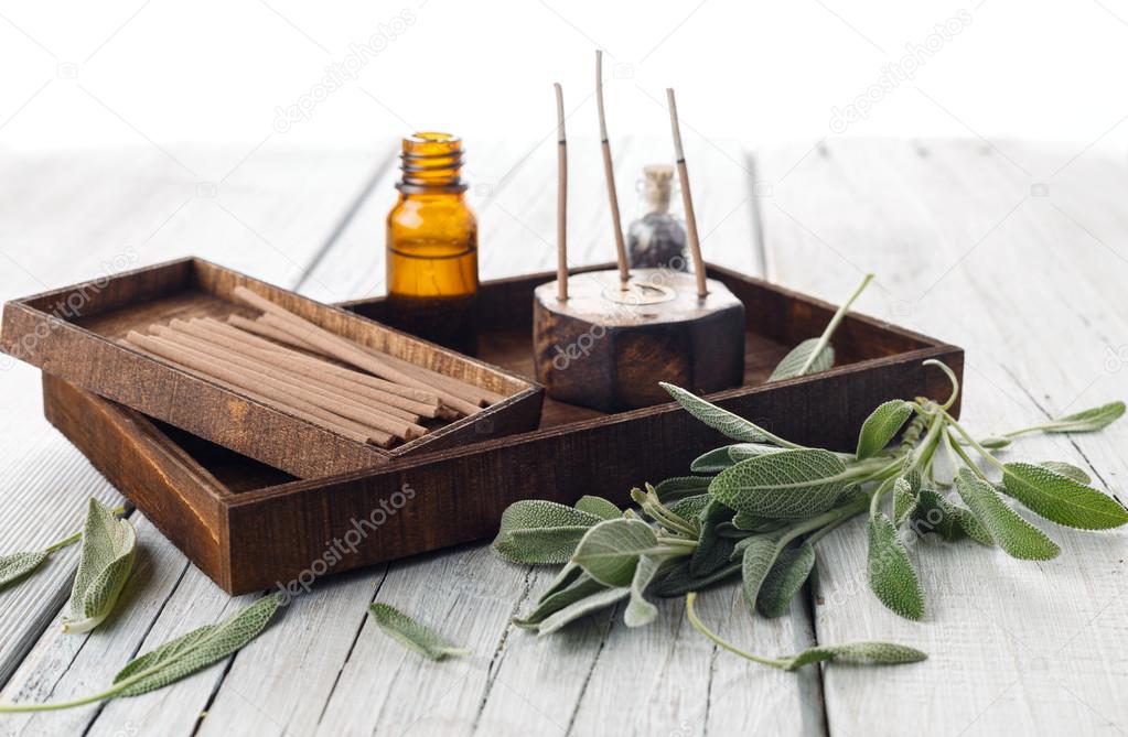 Fresh sage leaves with spa aromatherapy kit
