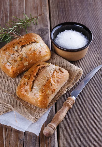 Ciabatta bread on rustic wooden background — Stock Photo, Image