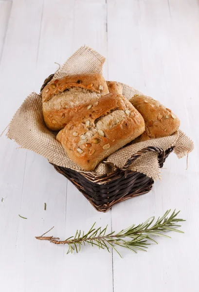 Ciabatta bread in a rustic woven basket — Stock Photo, Image