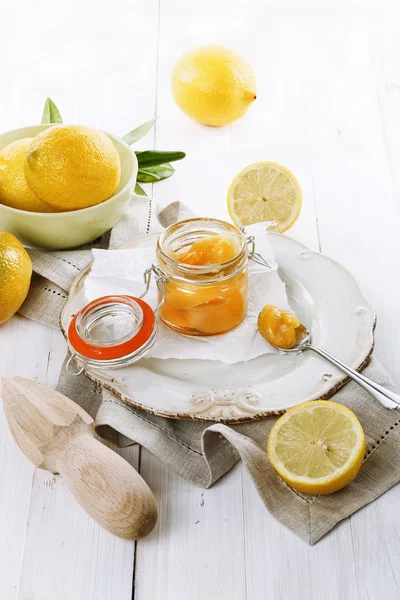 Lemon curd over white wood background — Stok Foto