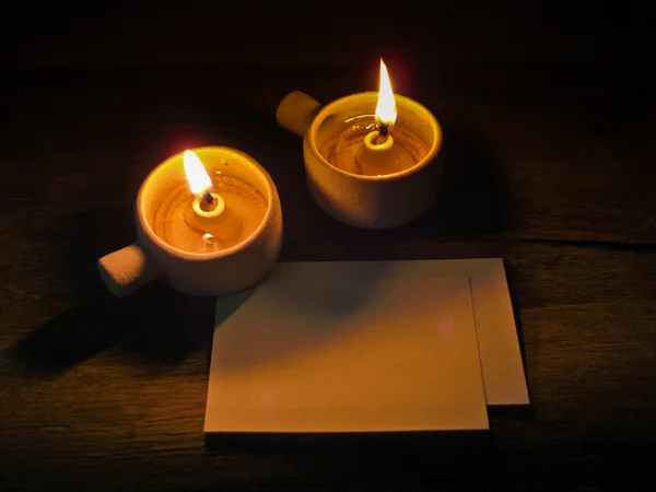 Svíčka a papír — Stock fotografie