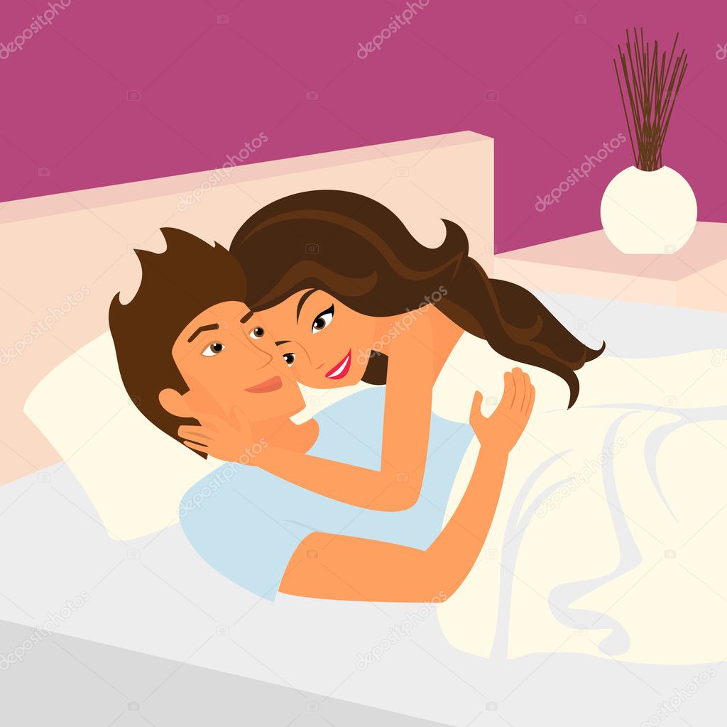 Happy couple relaxing in bed