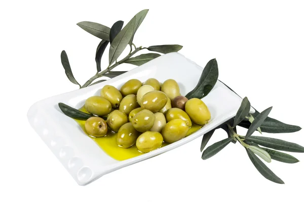 Olives on a white plate — Stock Photo, Image
