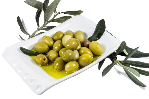 Olives and olive oil on the plate — Stock Photo, Image