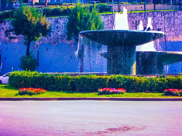 Fountain Intersection City View Green Fences Flowers — Stock Photo, Image