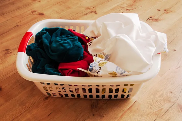 Dirty clothes in basket — Stock Photo, Image