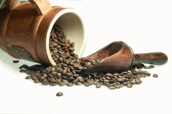 Coffee beans and wood spoon — Stock Photo, Image