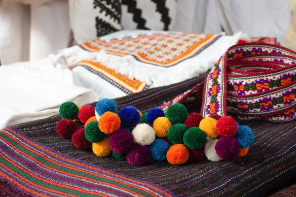 Garage sale in town hall, Tlum and Kram. Ukrainian clothes - traditional embroidered shirts. Secondhand goods on flea market, thrift shopping concept. Selective focus — Stock Photo, Image