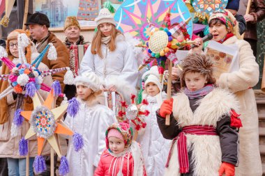 Lviv, Ukraine - January 8, 2022 : The flash of Christmas star festival, traditional Christmas stars festival. Celebration of Orthodox Christmas in Lviv. Selective focus