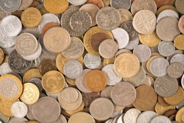 Coins background. Various vintage coins from worldwide as background. Financial growth and business concept. Numismatics, coin collecting
