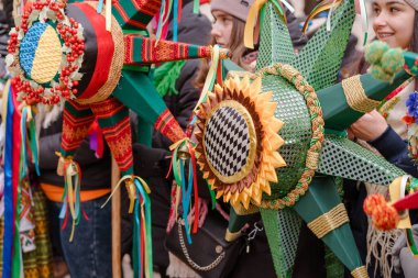 Lviv, Ukraine - January 8, 2022 : Ukrainian vertep, The flash of Christmas star festival, traditional Christmas stars festival. Celebration of Orthodox Christmas in Lviv. Selective focus