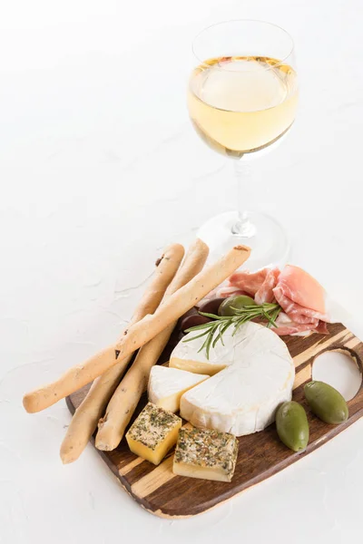 Wooden Charcuterie Board Selection Cheeses Prosciutto Served Together Olives Grissini — Stock Photo, Image