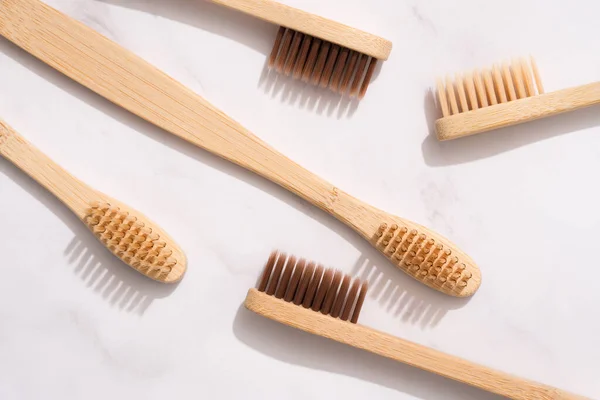 Closeup View Bamboo Toothbrushes Natural Bristle White Marble Table Background — Stock Photo, Image