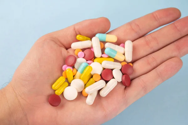 Man Holding Variety Medicine Pills Capsules Tablets His Hands Handful — Foto Stock