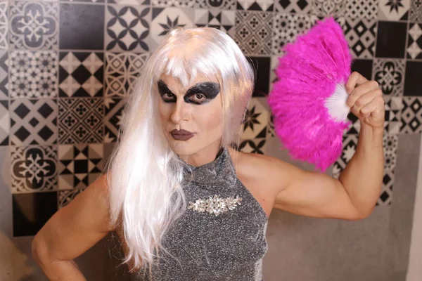 Close Portrait Transgender Woman Wig Dress Holding Pink Handheld Fan - Stock-foto