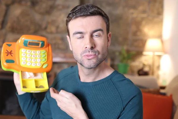 Close Portrait Handsome Young Man Holding Toy Cashier Machine — 스톡 사진