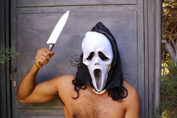 Close Portrait Handsome Shirtless Young Man Scream Mask Knife Grey — стоковое фото