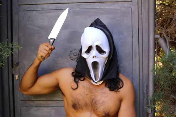 Close Portrait Handsome Shirtless Young Man Scream Mask Knife Grey — стоковое фото