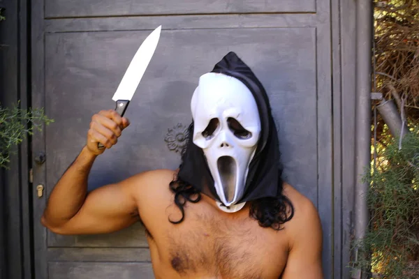 Close Portrait Handsome Shirtless Young Man Scream Mask Knife Grey — стоковое фото