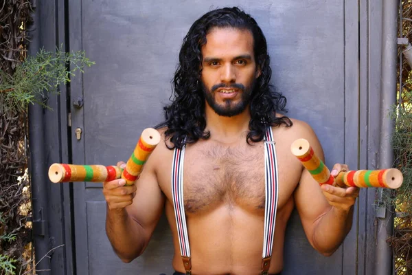 Close Portrait Handsome Young Man Colorful Juggling Sticks — Stock Photo, Image