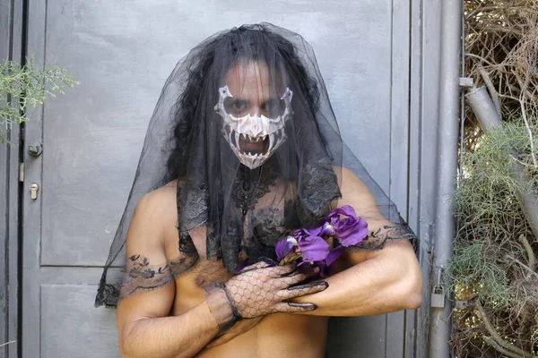 Close Portrait Shirtless Young Man Mask Black Veil Holding Purple — стоковое фото