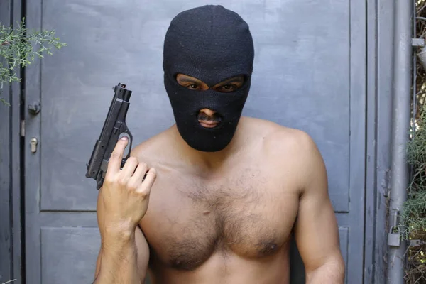 Assassino Do Homem Com O Torso sexy Na Máscara Imagem de Stock - Imagem  de terrorista, homem: 25877645