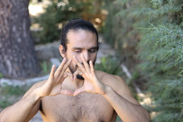 Close Portrait Handsome Shirtless Young Man Making Heart Shaped Gesture — стоковое фото