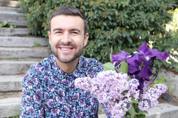Close Portrait Handsome Young Man Beautiful Blossoming Lilac Flowers Park — Foto Stock