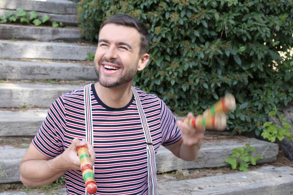 Close Portrait Handsome Young Man Juggling Sticks Outdoors — 스톡 사진