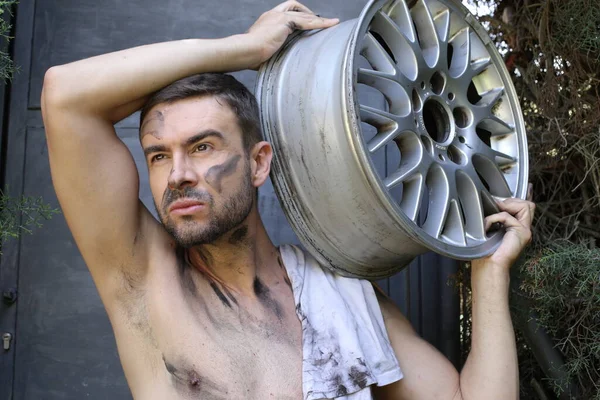 Close Portrait Handsome Young Shirtless Man Holding Vehicle Disk —  Fotos de Stock