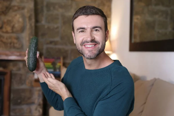 Close Portrait Handsome Young Man Holding Ripe Cucumber Home — Stock Fotó