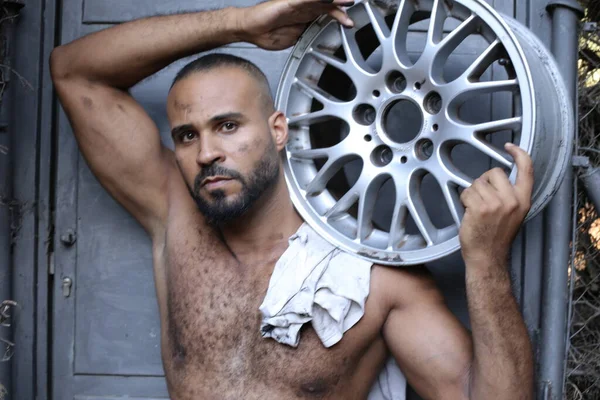 Close Portrait Handsome Shirtless Young Man Holding Car Wheel Front — 스톡 사진