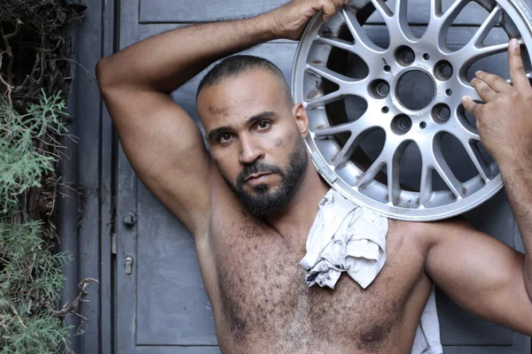 Close Portrait Handsome Shirtless Young Man Holding Car Wheel Front — Zdjęcie stockowe