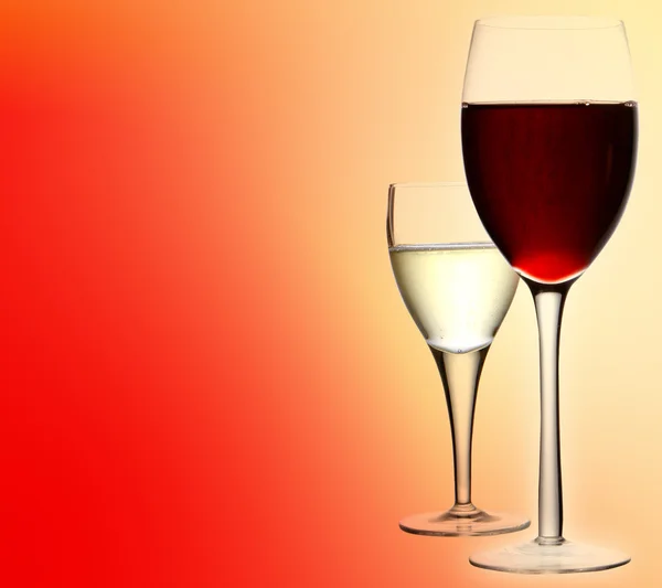 Glasses of red and white wine — Stock Photo, Image