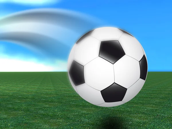 Voetbal in het gras — Stockfoto