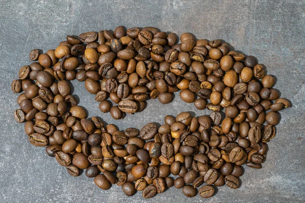 焙煎したコーヒー豆の食感の背景 コーヒー豆の背景 焙煎したコーヒー豆からの背景 — ストック写真