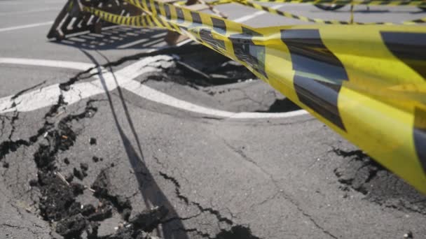 Dangerous Stretch Road Damaged Asphalt Accident Site Fenced Black Yellow — Vídeo de stock