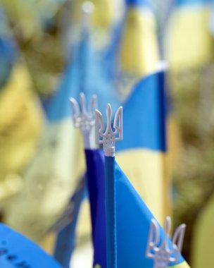 Ukrainian national official flag on blue sky background