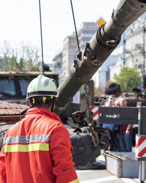 Destroyed military equipment in a military conflict. Broken tanks, combat vehicles and other burnt military equipment