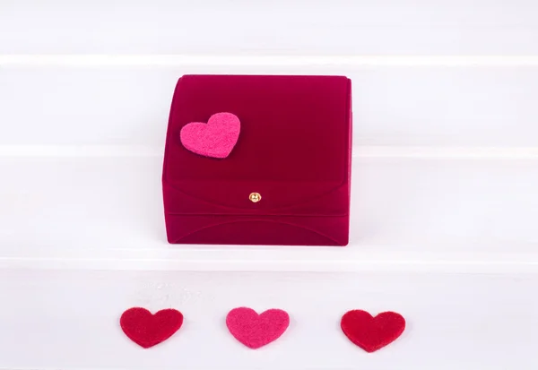 Red velvet gift box with a heart for St. Valentine Day — Stock Photo, Image