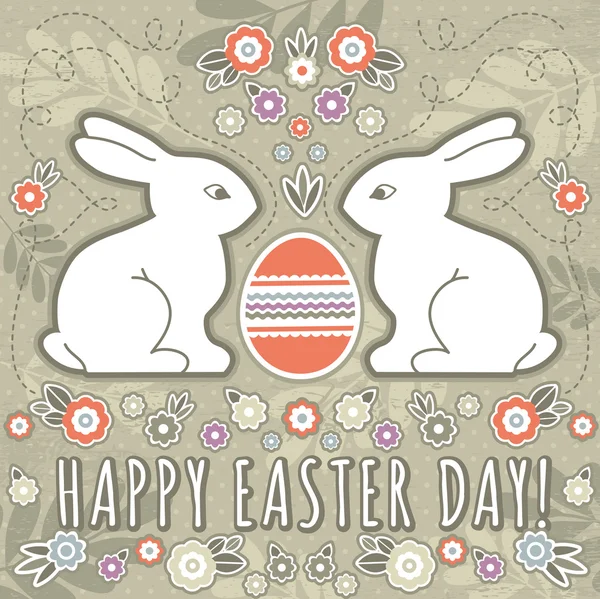 Tarjeta de felicitación con huevos de Pascua y dos conejos — Archivo Imágenes Vectoriales