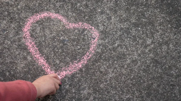 Young Girl Drawing Pink Heart Chalk Concrete Copy Space — Stock Photo, Image