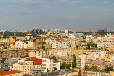 Kyiv, Ukraine  July 08, 2017: A beautiful panorama of Podil area. Aerial view on residential and industrial areas. A lot of buildings of different architectural style. Historical area, Dnipro river.