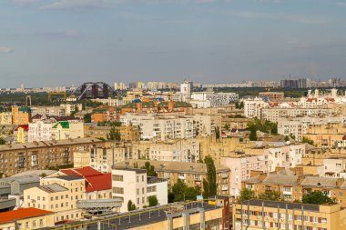 Kyiv, Ukraine  July 08, 2017: A beautiful panorama of Podil area. Aerial view on residential and industrial areas. A lot of buildings of different architectural style. Historical area, Dnipro river.